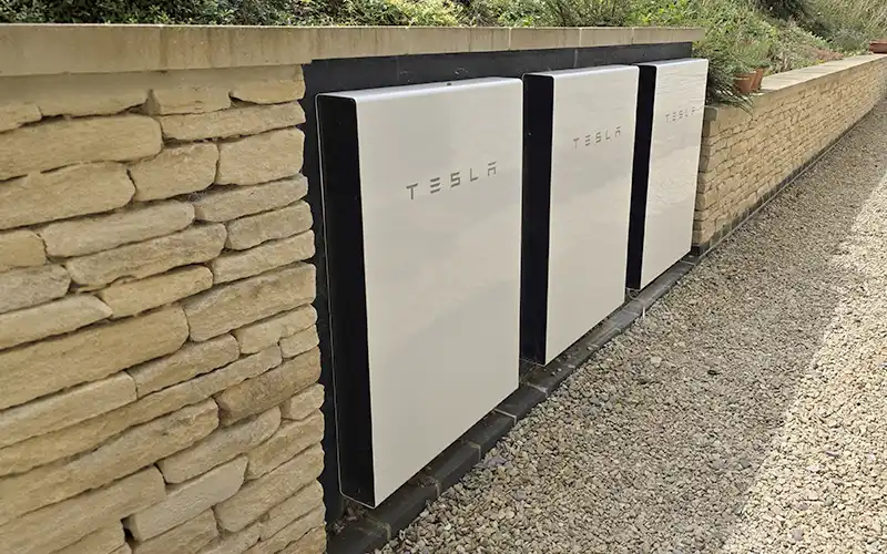 Three Tesla batteries installed at a property